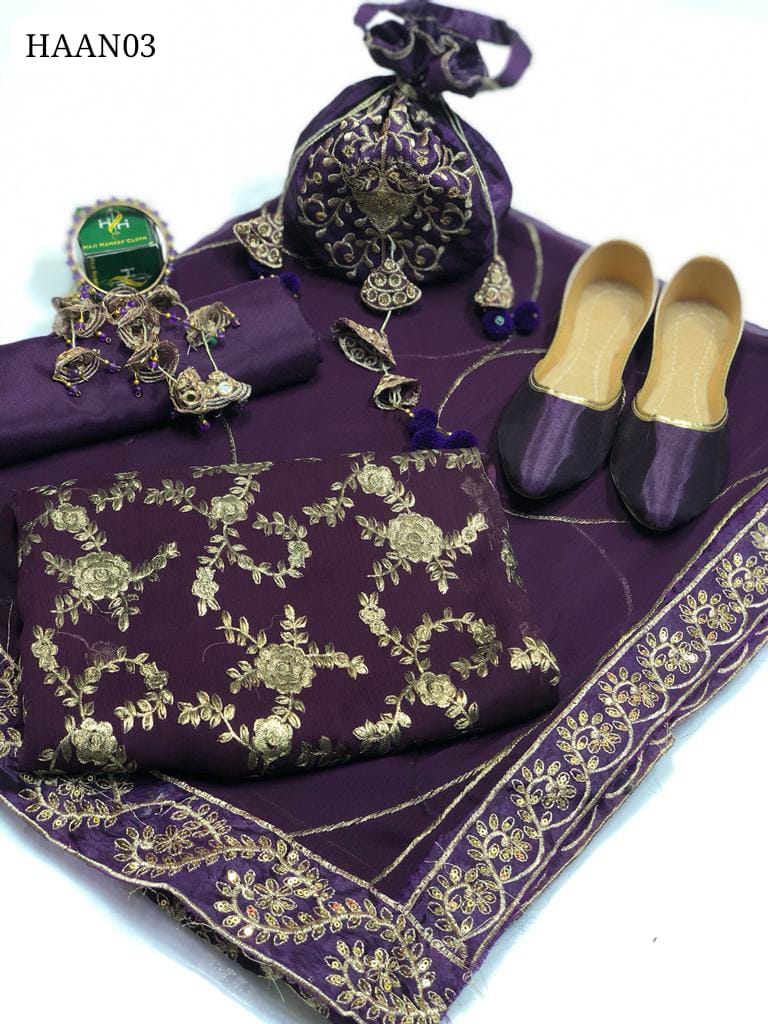 Crinkle Chiffon Fabric 6 Piece Multani Handmade Full Embroidered Shirt With Crinkle Chiffon Dupatta Four Side Border And Pure Crinkle Chiffon Stuff Malai Trouser. Along with color matching clutch bracelet.