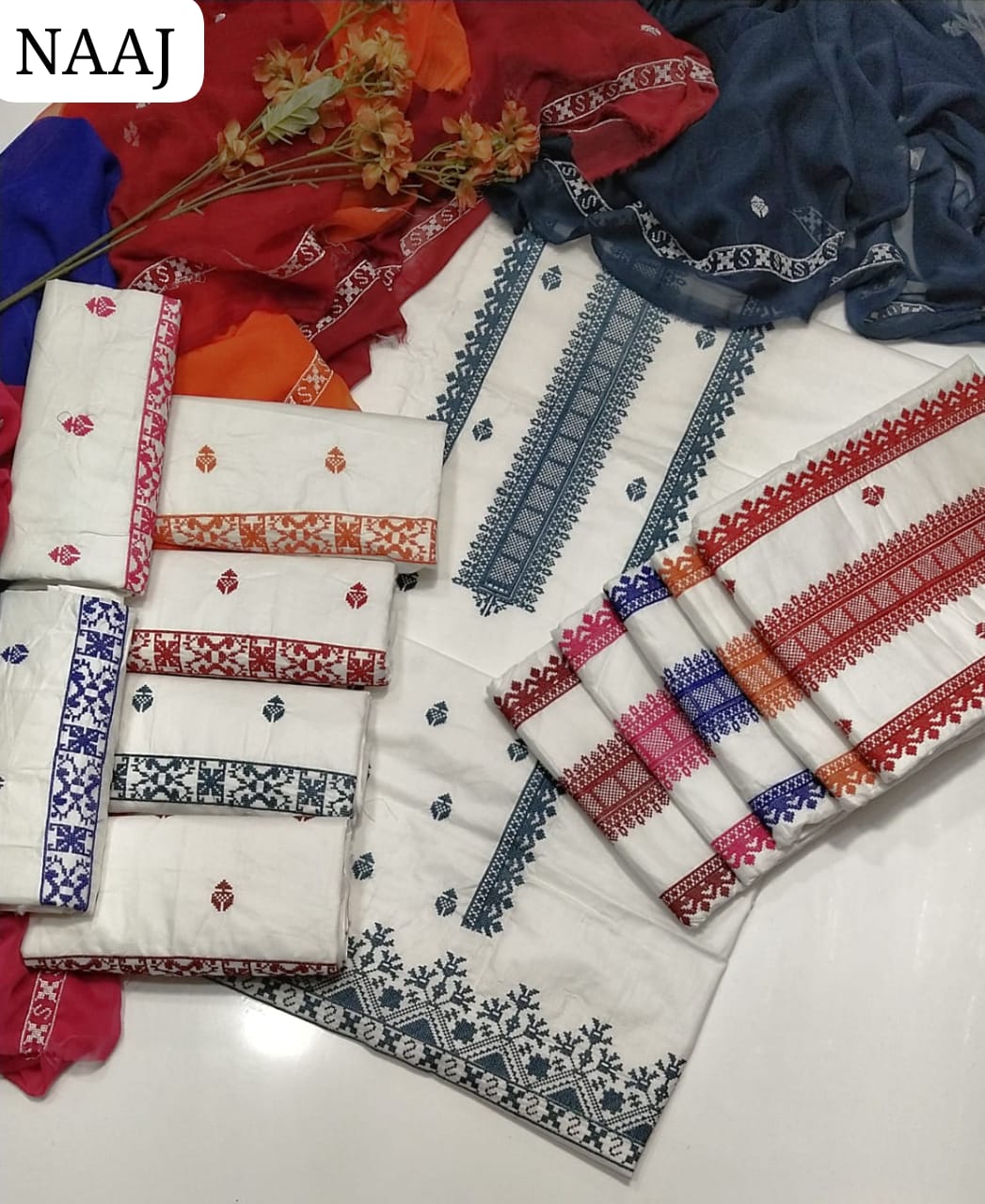 Lawn Cotton Fabric Cross Stich  Embroidered Shirt With  Contras Krinkle Chiffon Embroidery Dupatta Along And Lawn Cotton Embroidered Trouser 3Pc Dress
