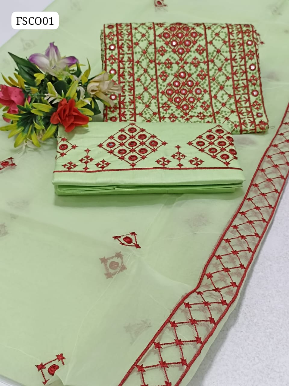 Soft Lawn Fabric Back Ground Battik Print Embroided Computer Cross Stich With 9mm Gala Daman Work Shirt With Same Colour Organza Embroided Dupatta And Same Colour Embroided Trouser 3Pc Dress